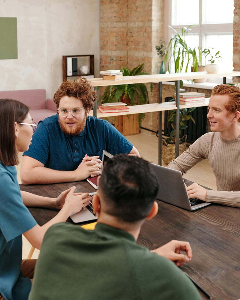 Visitor attraction team reviewing visitor data and analytics to inform decisions