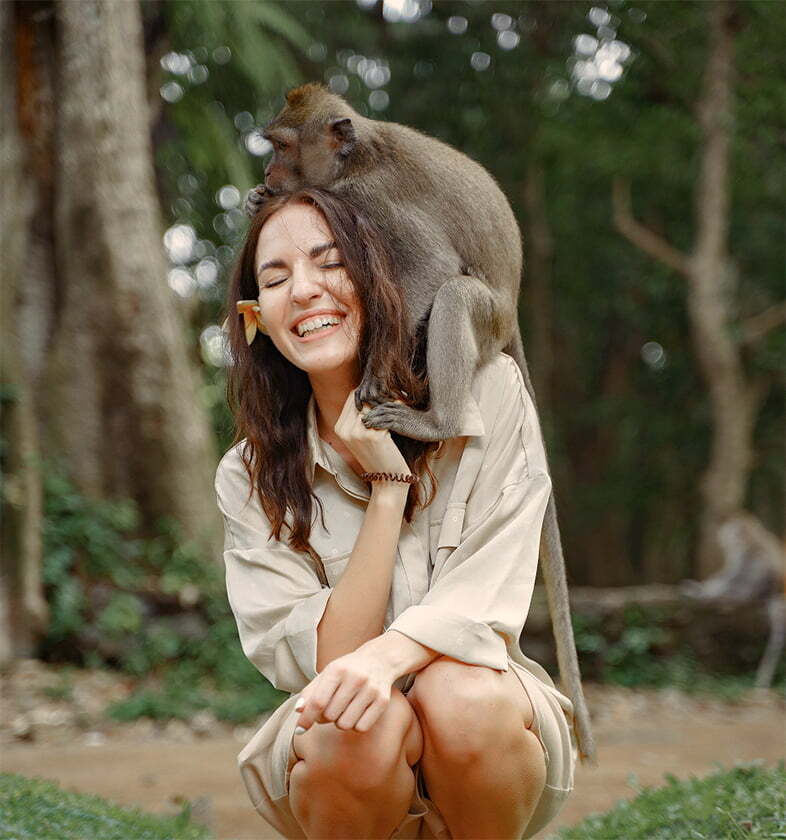 Visitor spending time with the animals at a zoo