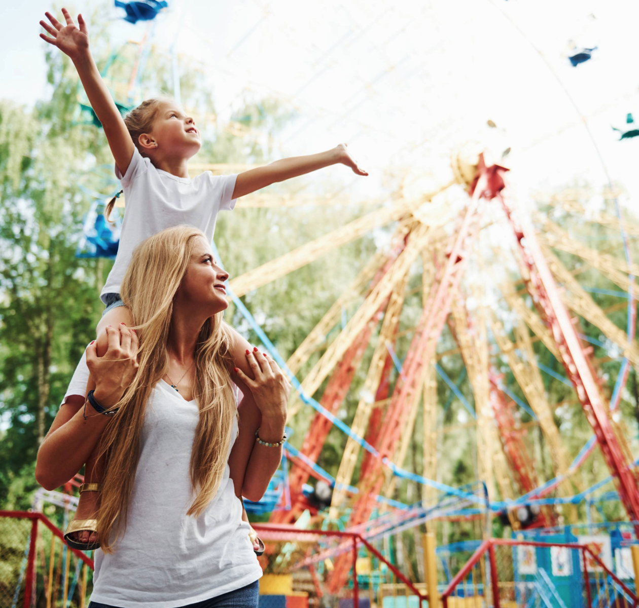 Mum and son have fun at a funfair Visitor attraction