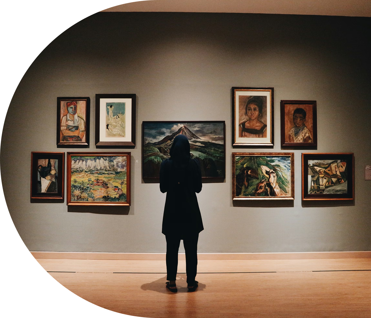 A person admiring gallery art