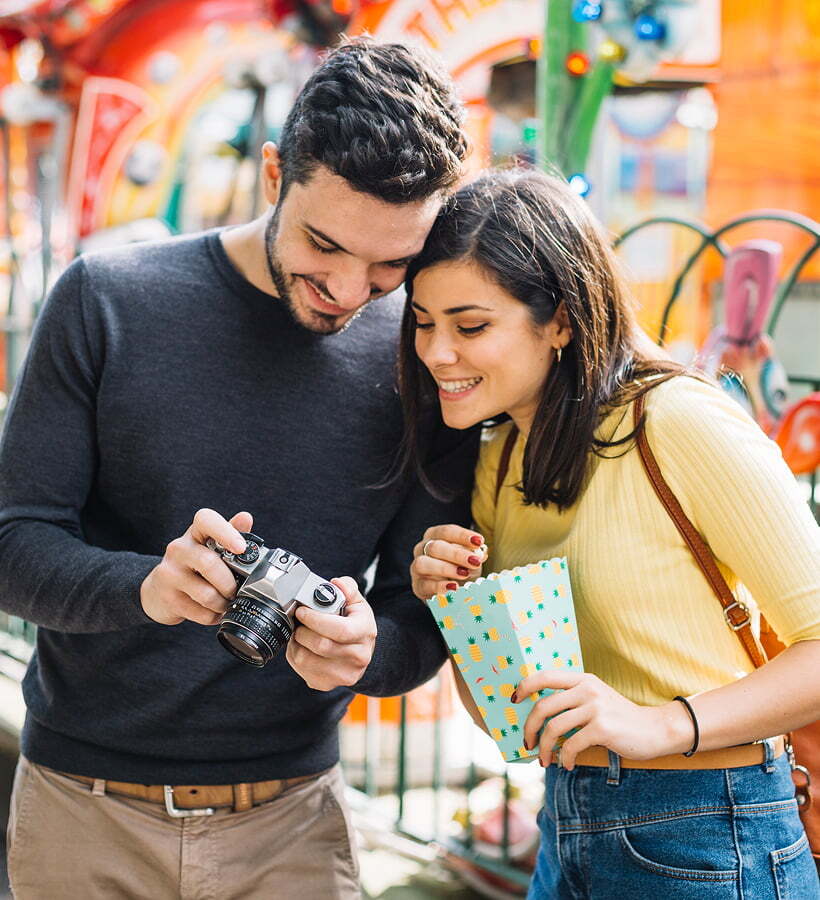 Friends taking photos at a Visitor Attraction